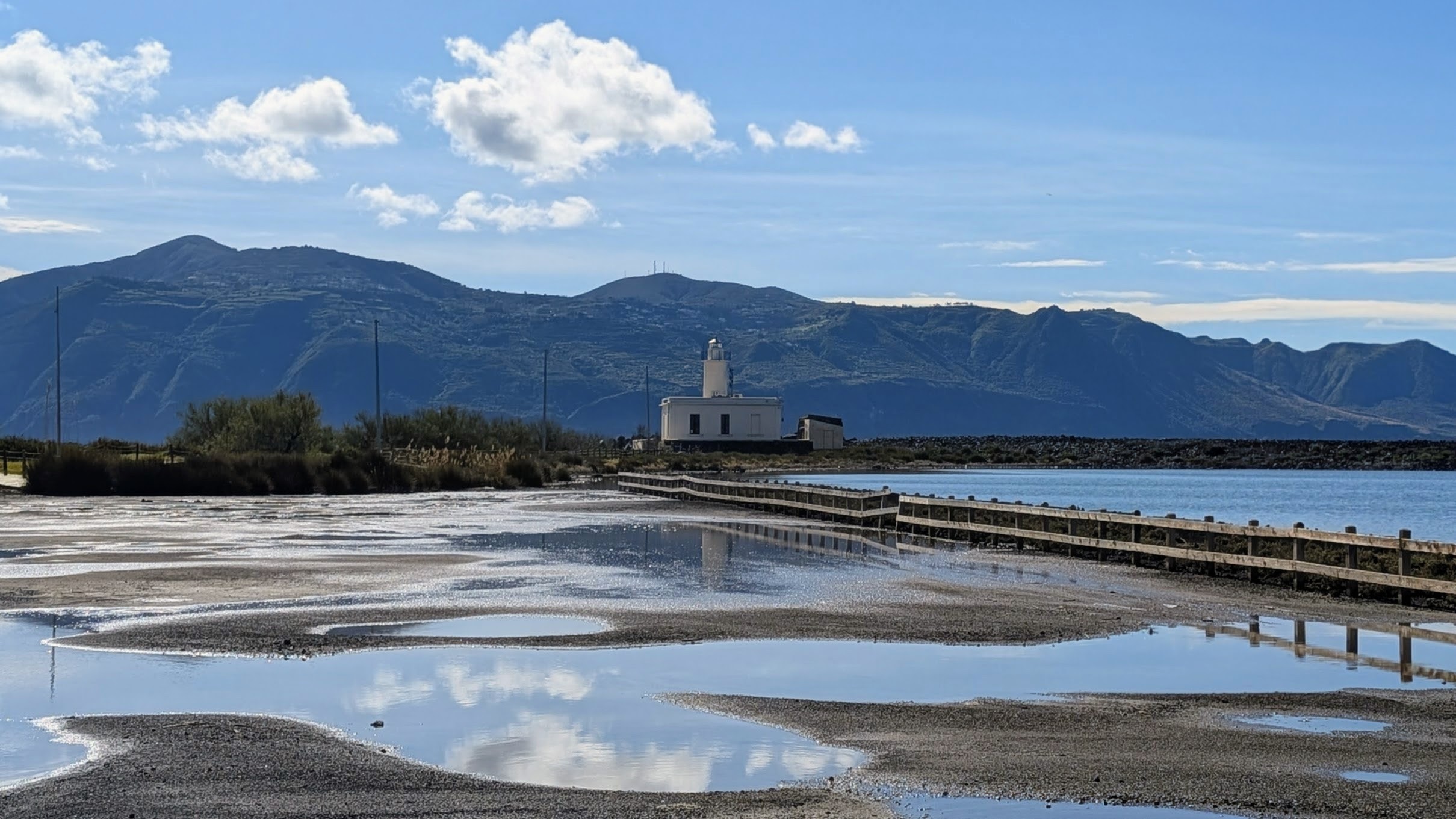 The lagoon at Punta Lingua which was historically used as a salt pond. Village of Lingua on Salina island.