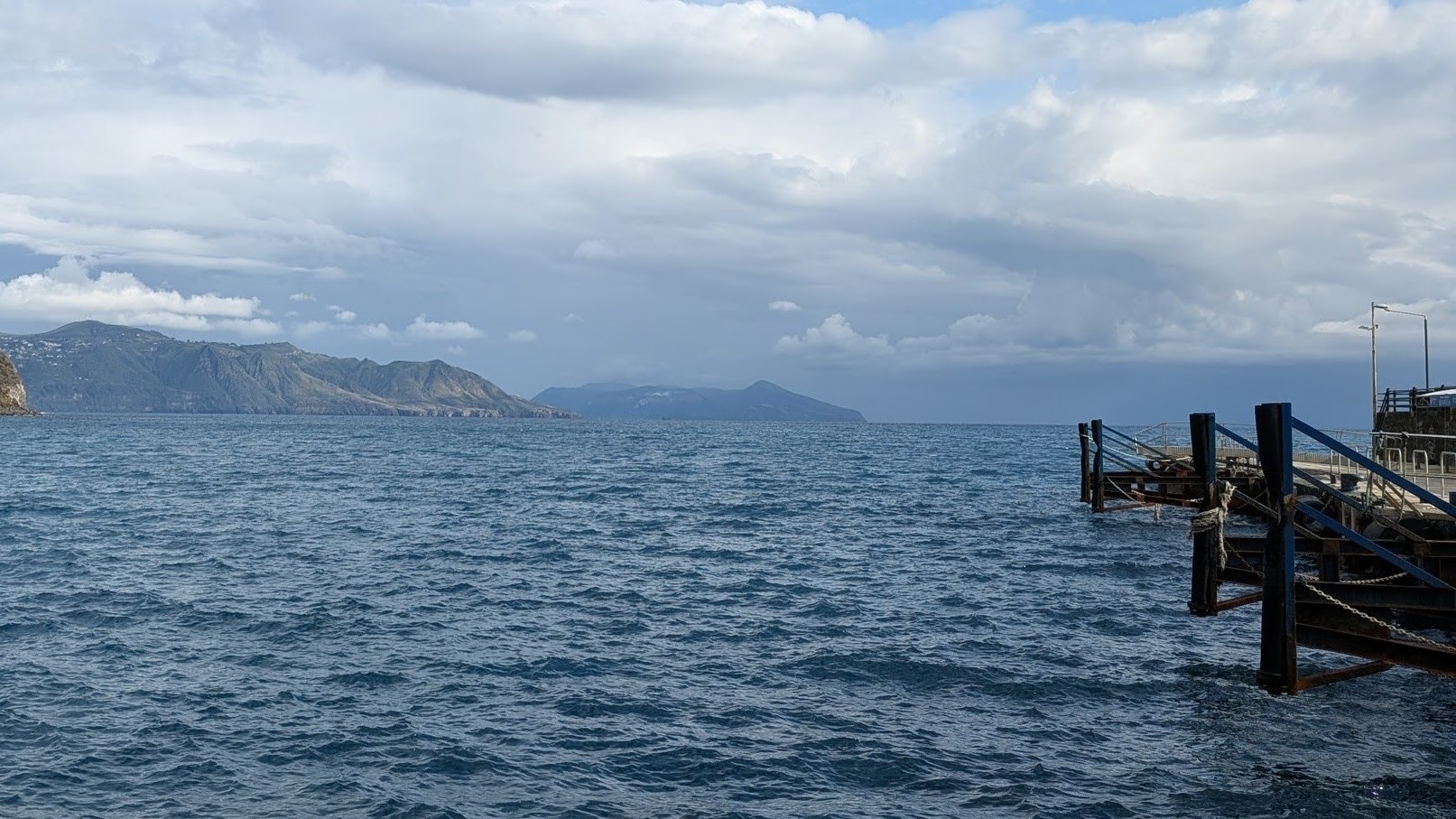 The pier in the harbor in the village of Rinella on the south of Salina isalnd.