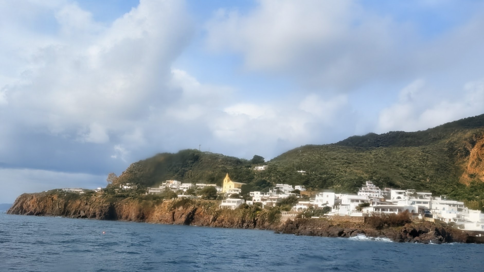 Passing on a boat by Panarea, the most exclusive of Aeolian islands.