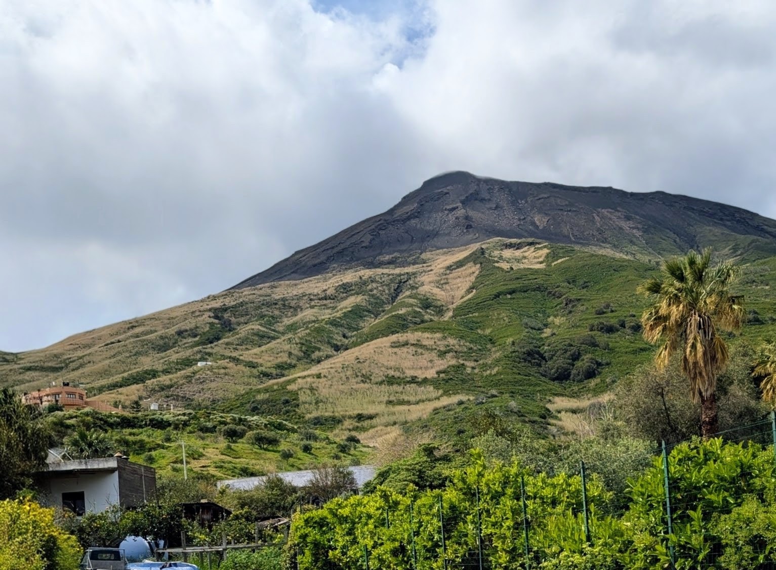 The village of San Vincenzo and the view on Stromboli volcano.
